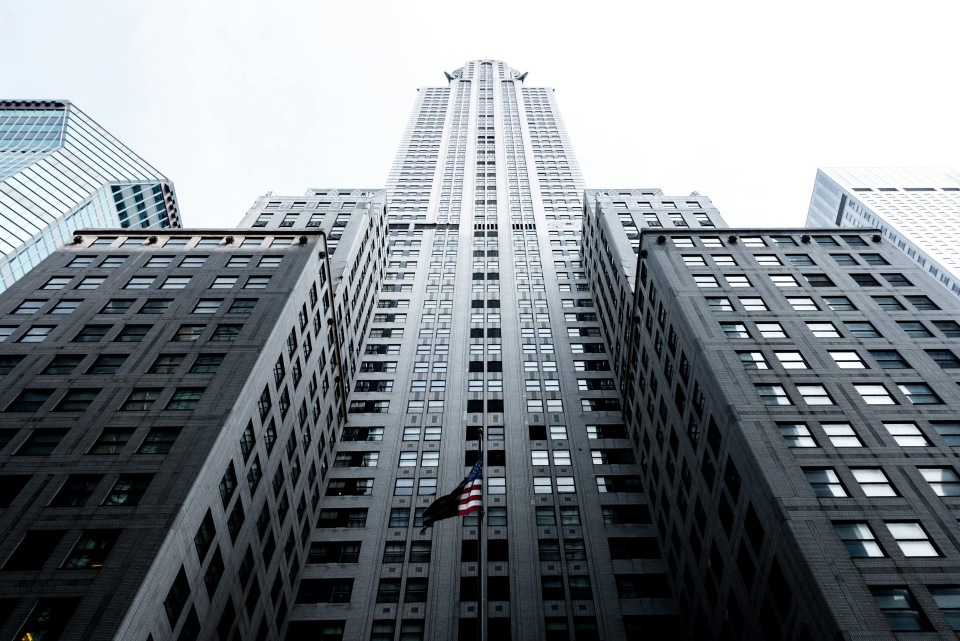 Tall skyscraper building viewed from below